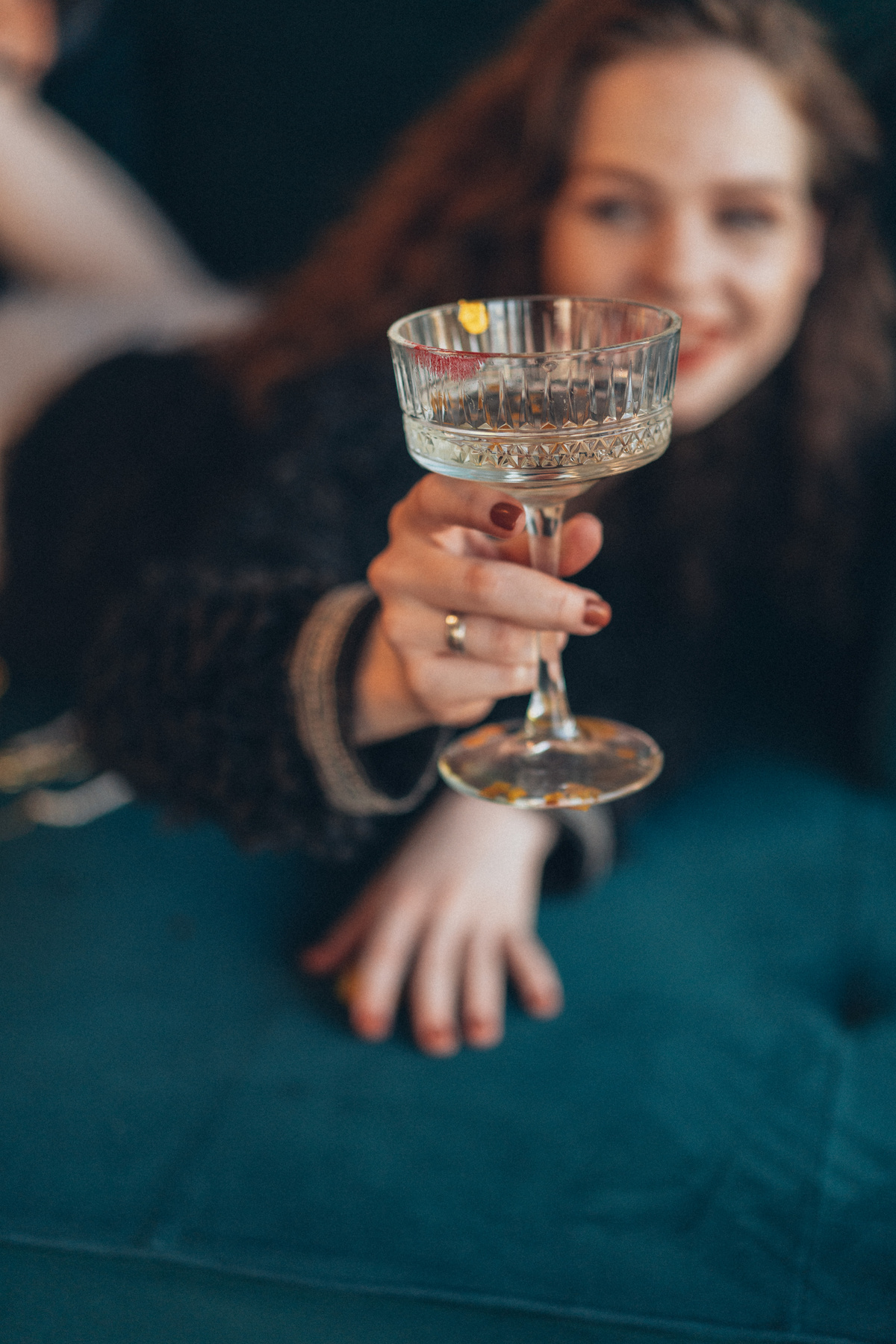 Woman Holding a Glass of Champagne
